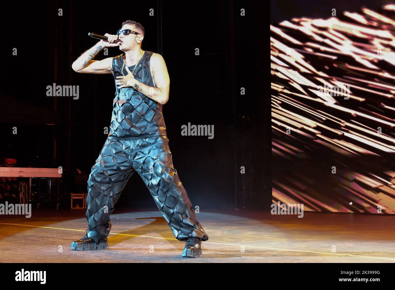 Verona, Italy. 25th September, 2022. The Italian rappers Fabio Bartolo Rizzo as know with Marracash pseudonym sings on a stage for his Persone Tour at Arena di Verona in Verona, Italy, on 25 September 2022 Credit: Roberto Tommasini/Alamy Live News Stock Photo
