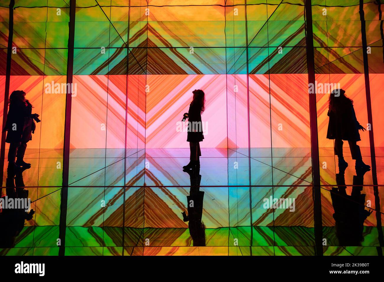 London, UK. 25th September, 2022. INTO SIGHT. The large-scale installation by Sony Design sees audience behaviour influence the visuals and soundscape. It combines Sony's Crystal LED display systems with generative sound, see-through glass walls and mirrors. The work is on show as part of the 20th London Design Festival 2022. Credit: Guy Corbishley/Alamy Live News Stock Photo