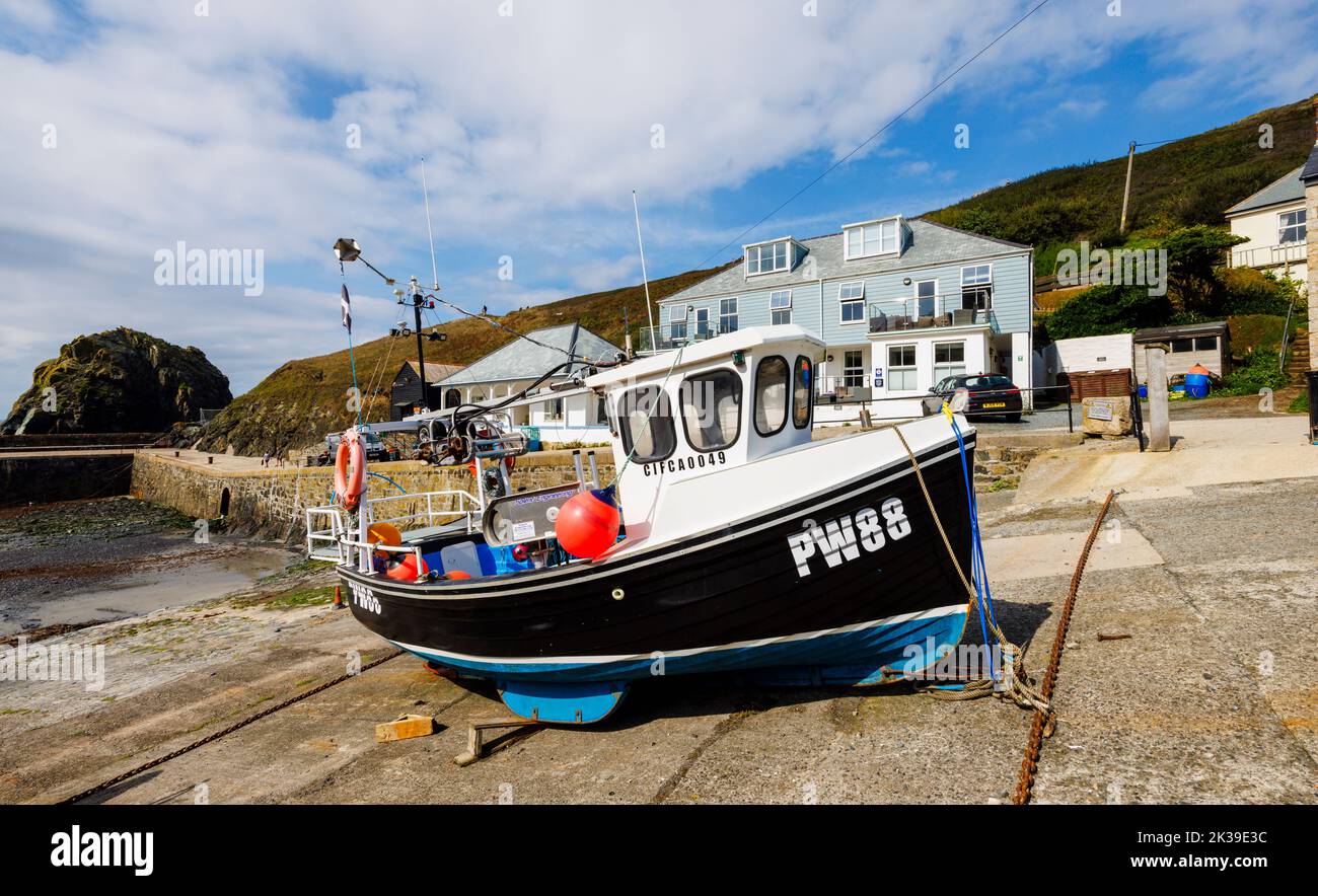 Fishing boat in the harbour at Mullion Cove, a small community on the west coast of the Lizard Peninsula, Cornwall, on the eastern side of Mount's Bay Stock Photo