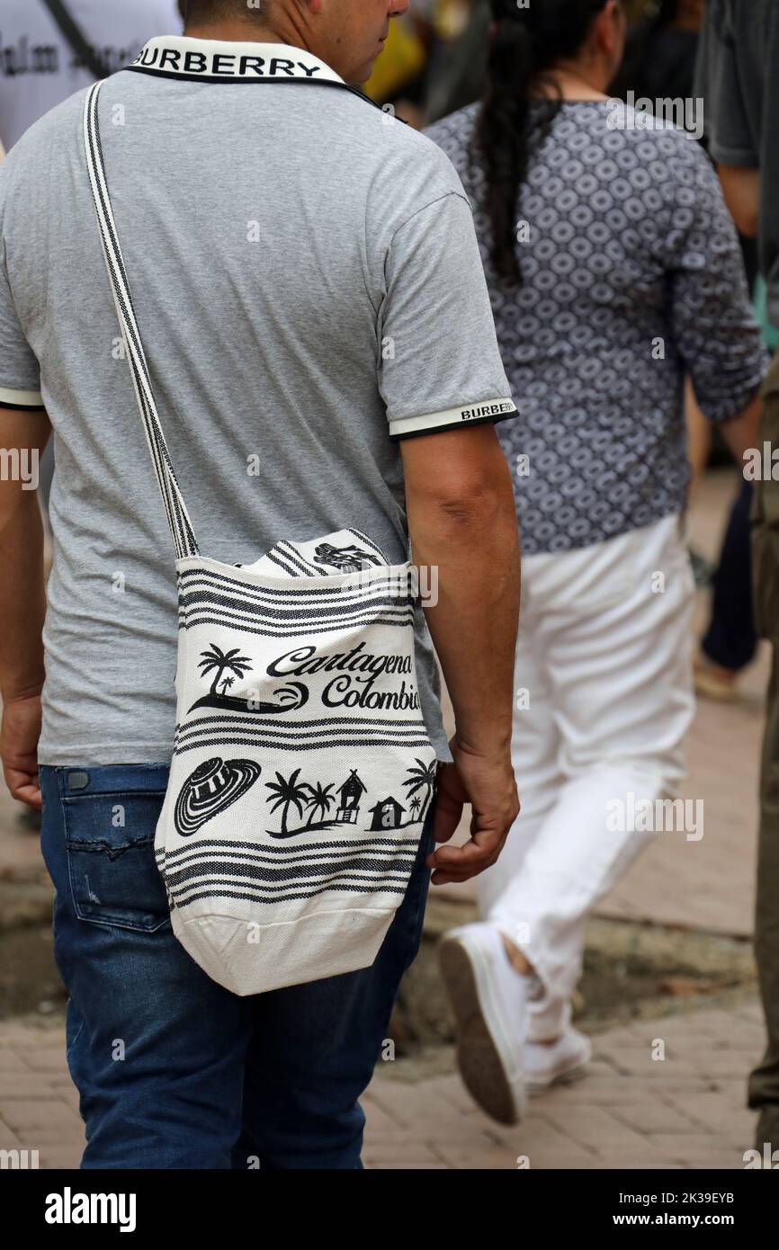 Man with souvenir bag in Colombia Stock Photo