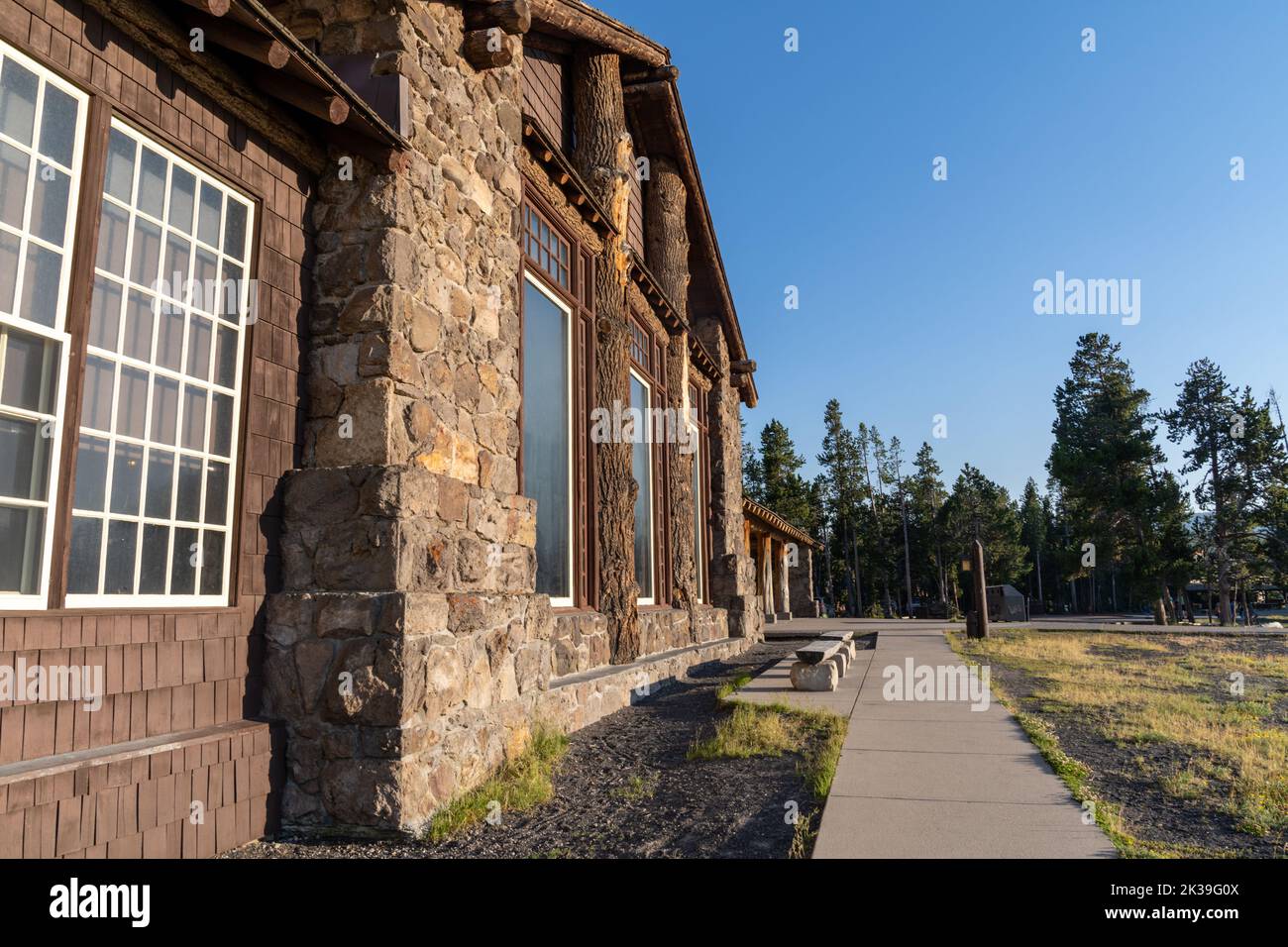 Wyoming, USA - July 19, 2022: Outside the historic Old Faithful Lodge hotel in Yellowstone National Park during summer Stock Photo