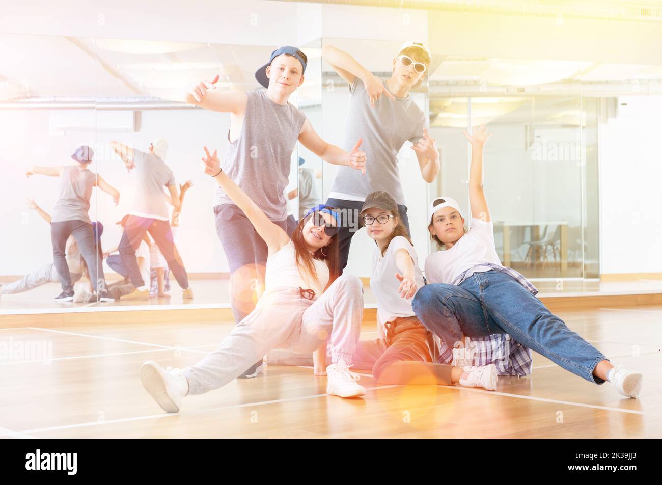 Teens hip hop dancers posing in studio Stock Photo - Alamy