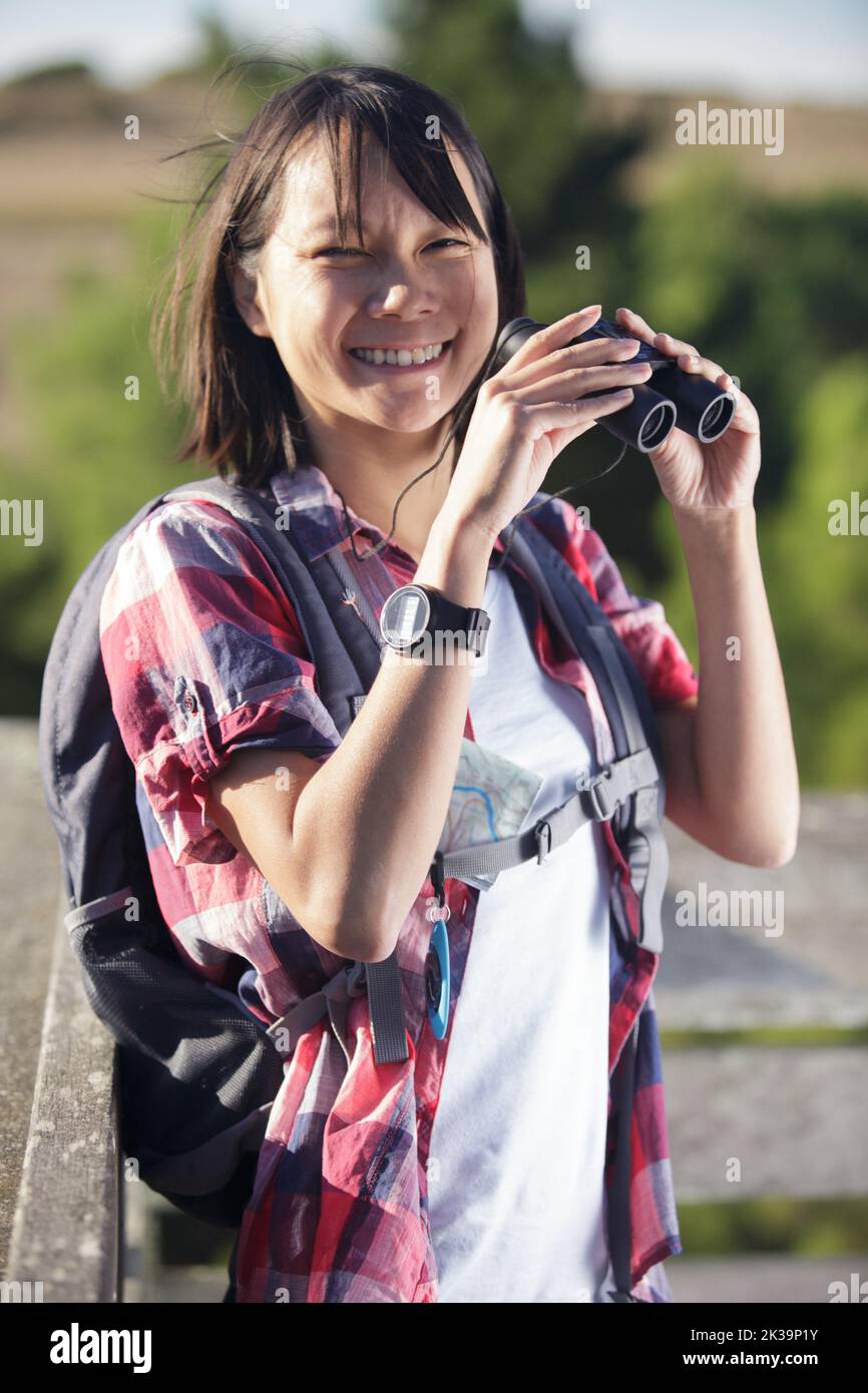 Woman mountain top binocular hi-res stock photography and images - Alamy