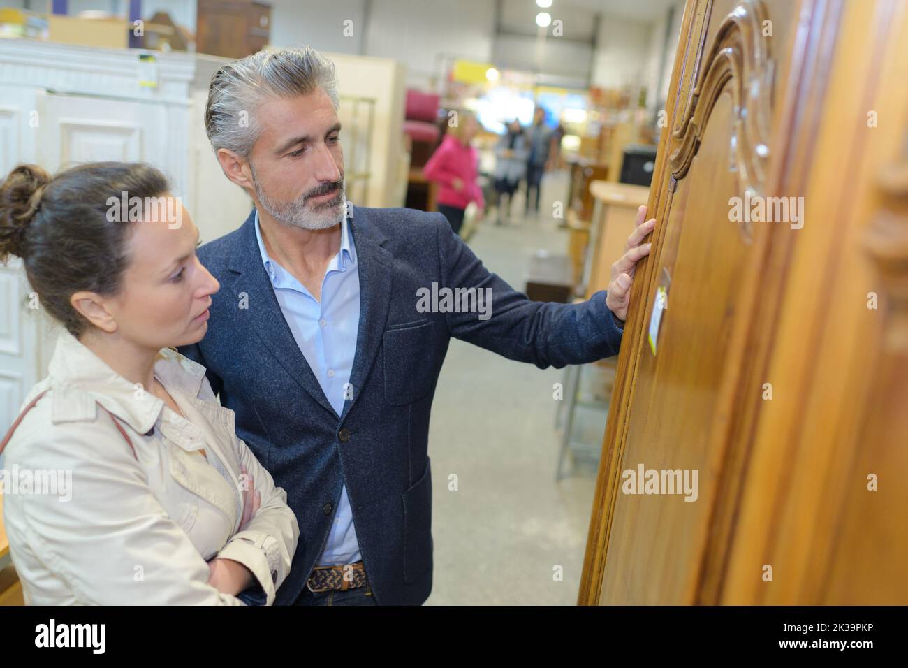 Ouple In Furniture Store Or Showroom Calculating Price Stock Photo Alamy