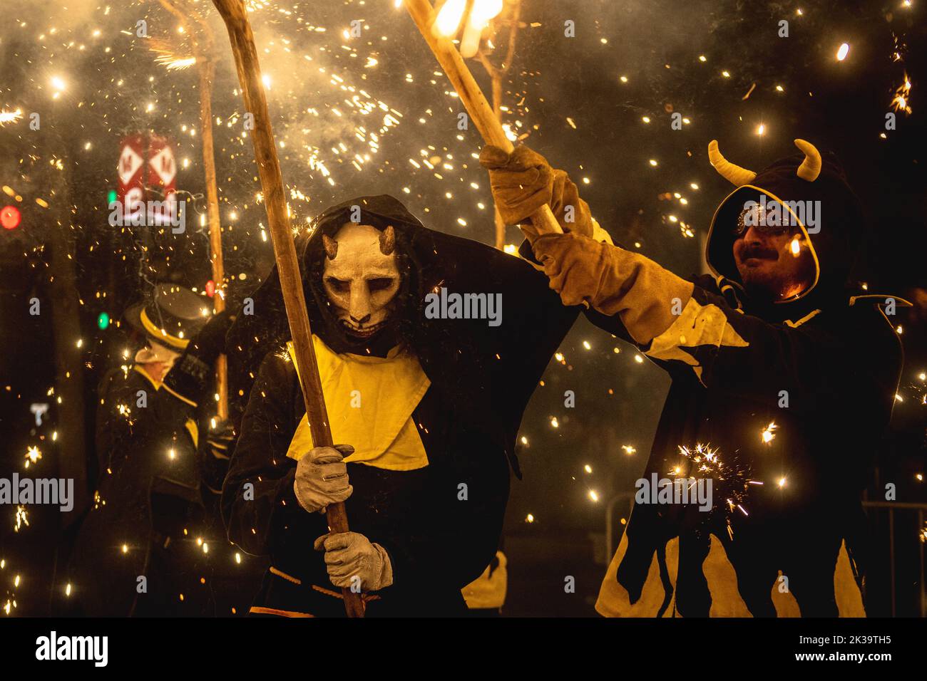 Barcelona, Spain. 25th Sep, 2022. A devil sets off his fireworks among the crowd of spectators at the Merce Festival of Barcelona. Credit: Matthias Oesterle/Alamy Live News Stock Photo