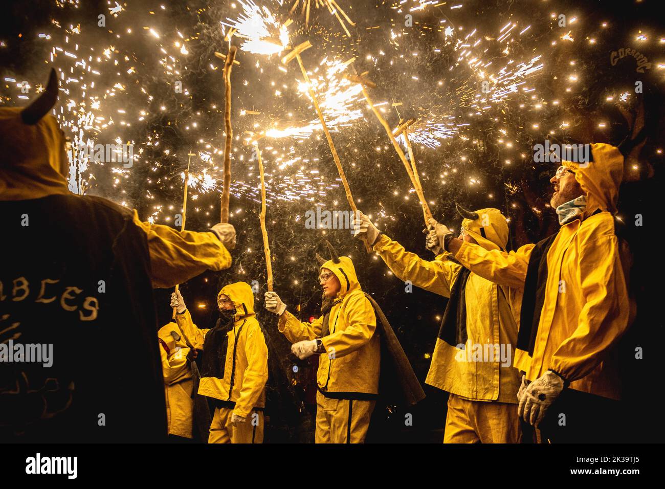 Barcelona, Spain. 25th Sep, 2022. 'Devils' gather to enlighten their stick mounted fire crackers during the 'correfics' at the Merce Festival of Barcelona. Credit: Matthias Oesterle/Alamy Live News Stock Photo