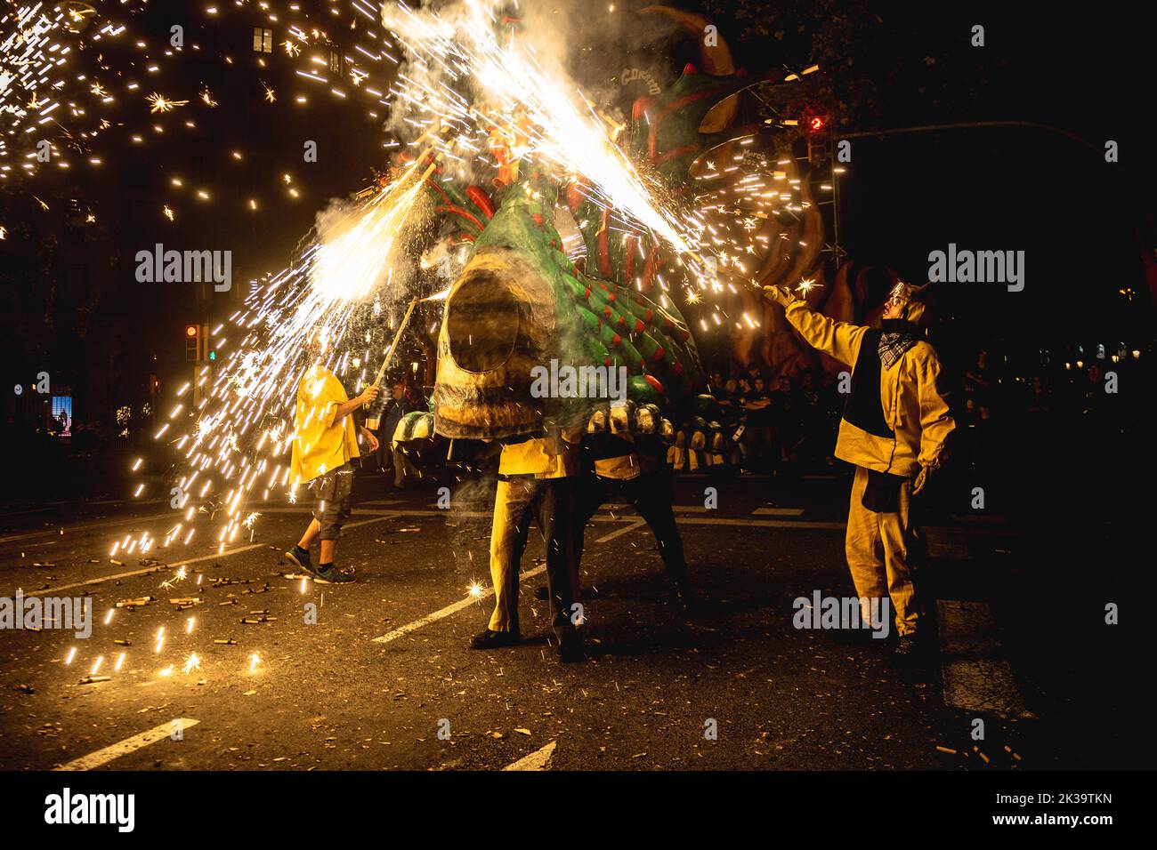 Barcelona, Spain. 25th Sep, 2022. A fire beast sets off his fire crackers during the 'correfics' at the Merce Festival of Barcelona. Credit: Matthias Oesterle/Alamy Live News Stock Photo
