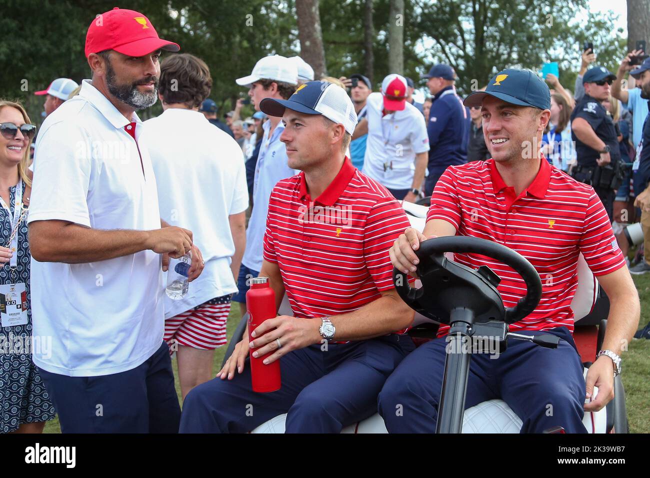 Charlotte, North Carolina, USA. 25th Sep, 2022. (L-R) Michael Greller, Jordan Spieth, and Justin Thomas in a golf cart after the USA team defeated the International team on the 18th green during the 5th round of the 2022 Presidents Cup at Quail Hollow Club. (Credit Image: © Debby Wong/ZUMA Press Wire) Credit: ZUMA Press, Inc./Alamy Live News Stock Photo