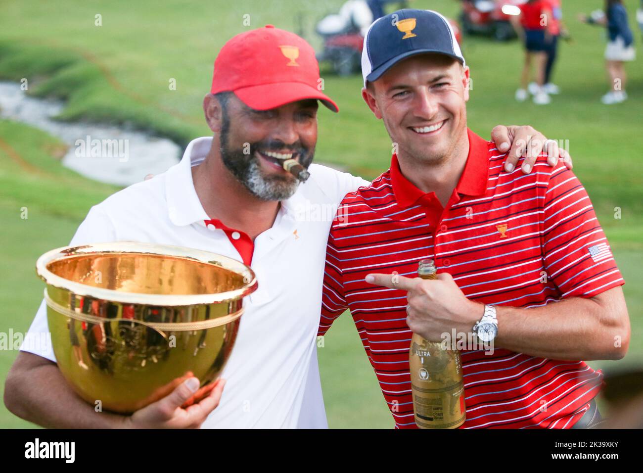 Charlotte, North Carolina, USA. 25th Sep, 2022. Jordan Spieth (R) and his caddie Michael Greller celebrate after defeating the International team at the 2022 Presidents Cup at Quail Hollow Club. (Credit Image: © Debby Wong/ZUMA Press Wire) Credit: ZUMA Press, Inc./Alamy Live News Stock Photo