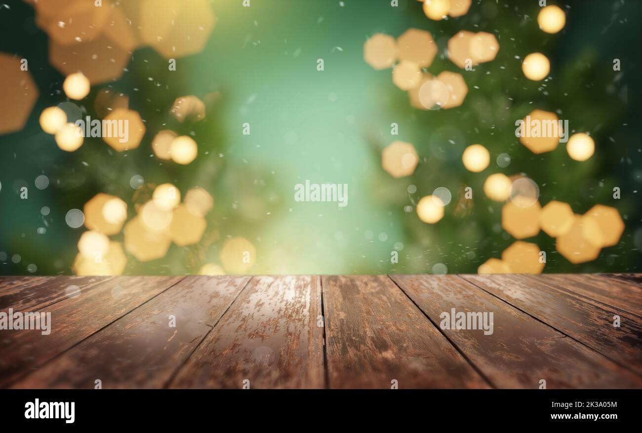 Festive wooden table background with christmas tree lights. Stock Photo
