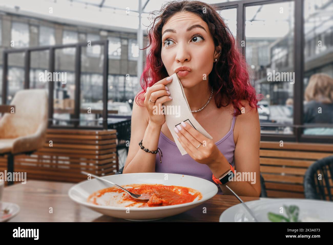 Woman wipes mouth hires stock photography and images Alamy