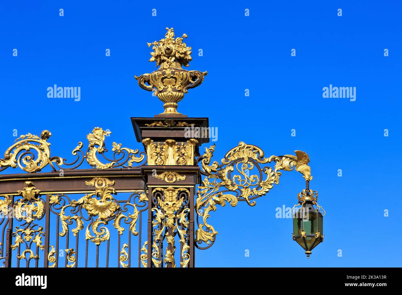 Close-up of the gilded decorations on one of the wrought iron gates with lantern at Place Stanislas in Nancy (Meurthe-et-Moselle), France Stock Photo