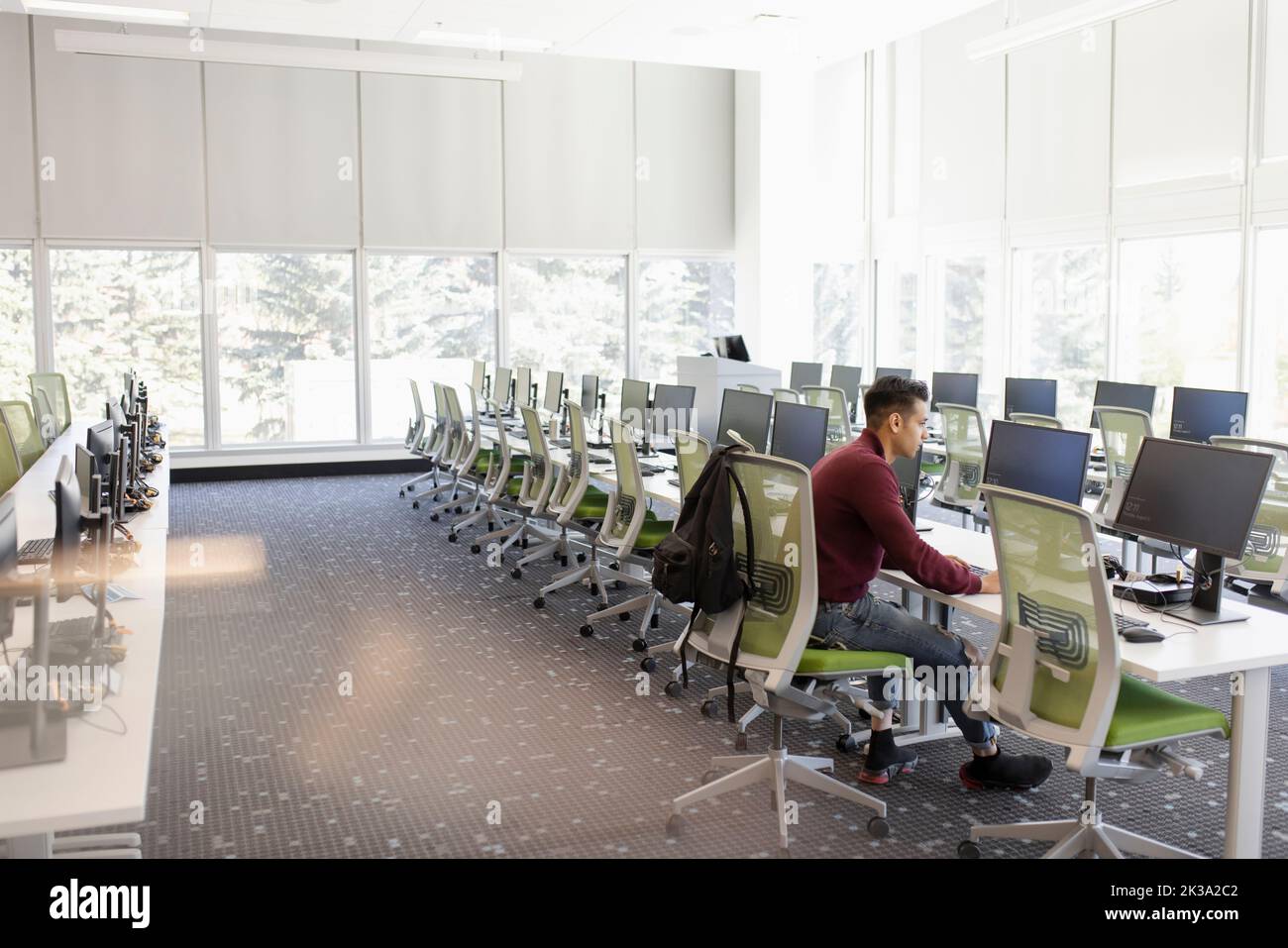 Black male student working at computer hi-res stock photography and ...