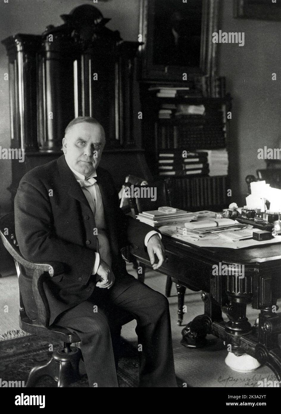 A portrait of US President William McKinley at his desk in the Treaty Room of the White House. McKinley was the 25th president of the USA, and the third of four to be assassinated. He was shot by Leon Czolgosz on 6th September 1901. Like James Garfield, McKinley briefly recovered from the wounds, to die of sepsis some time later. In this engraving he is seen as a presidential candidate. Stock Photo