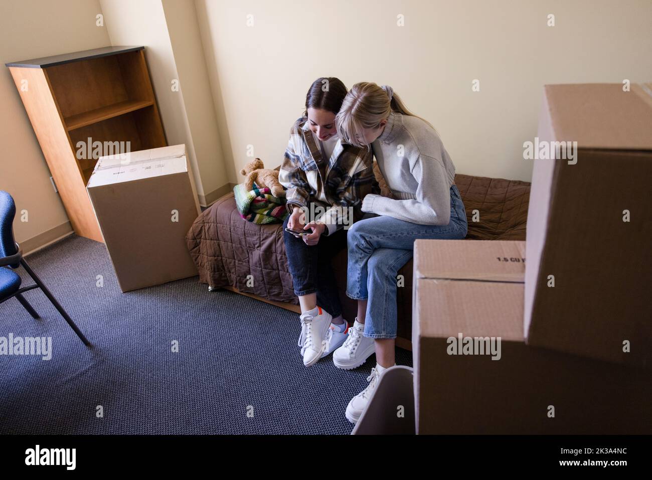 Young female roommates moving into college dorm room Stock Photo Alamy