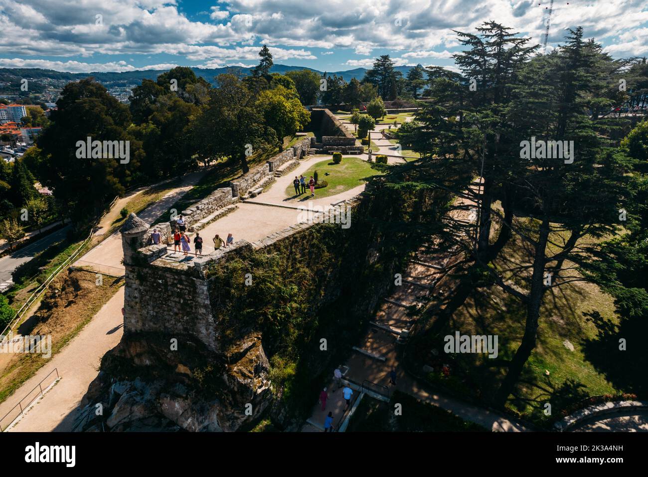 Vigo, Spain - September 25, 2022: Drone aerial view of tourists at Monte do Castro park in Vigo, Spain Stock Photo