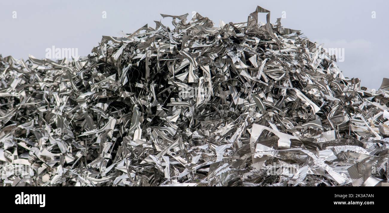 Scrap metal heap. Discarded material sorted and  prepared for recycling. Stock Photo
