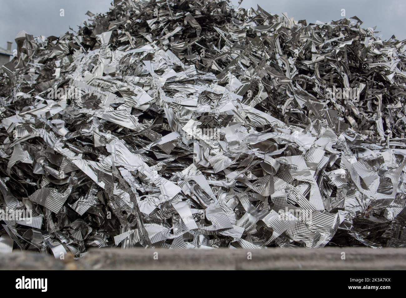 Scrap metal heap. Discarded material sorted and  prepared for recycling. Stock Photo