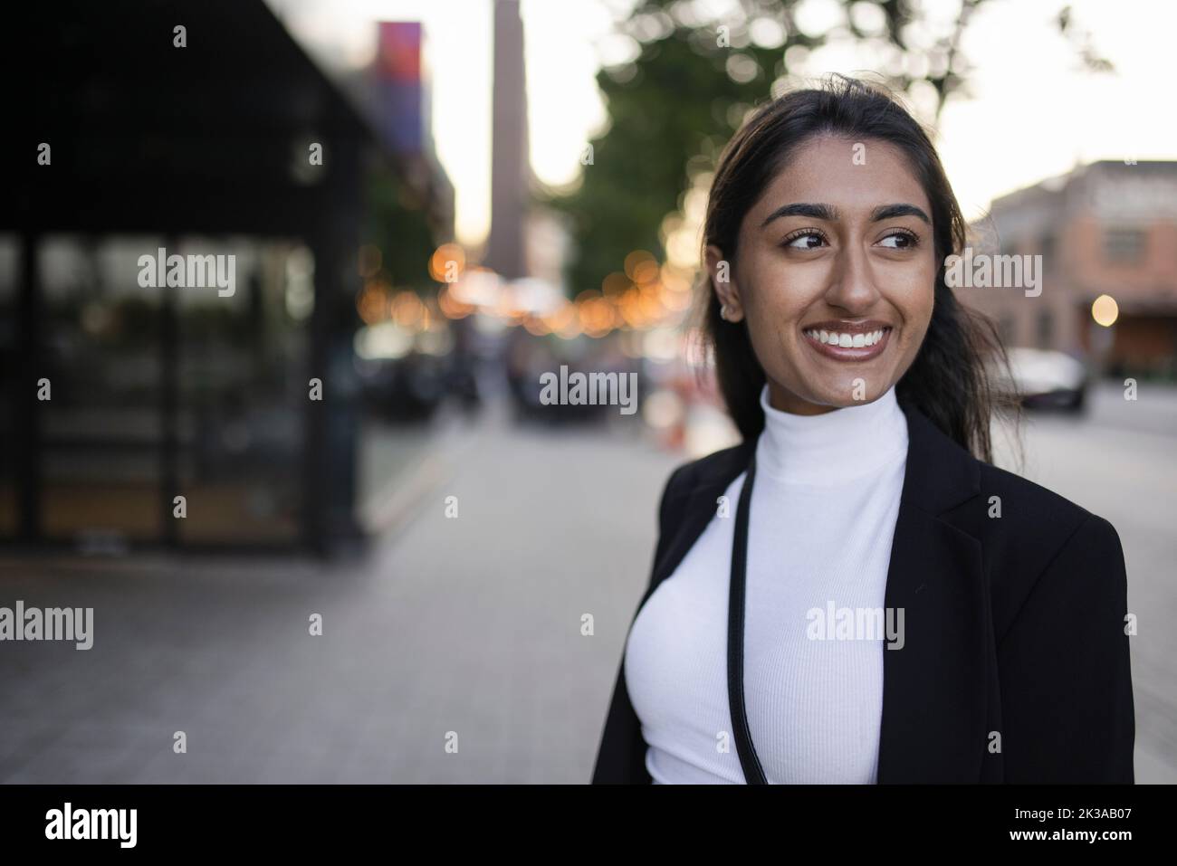 Portrait of south asian woman on city street Stock Photo