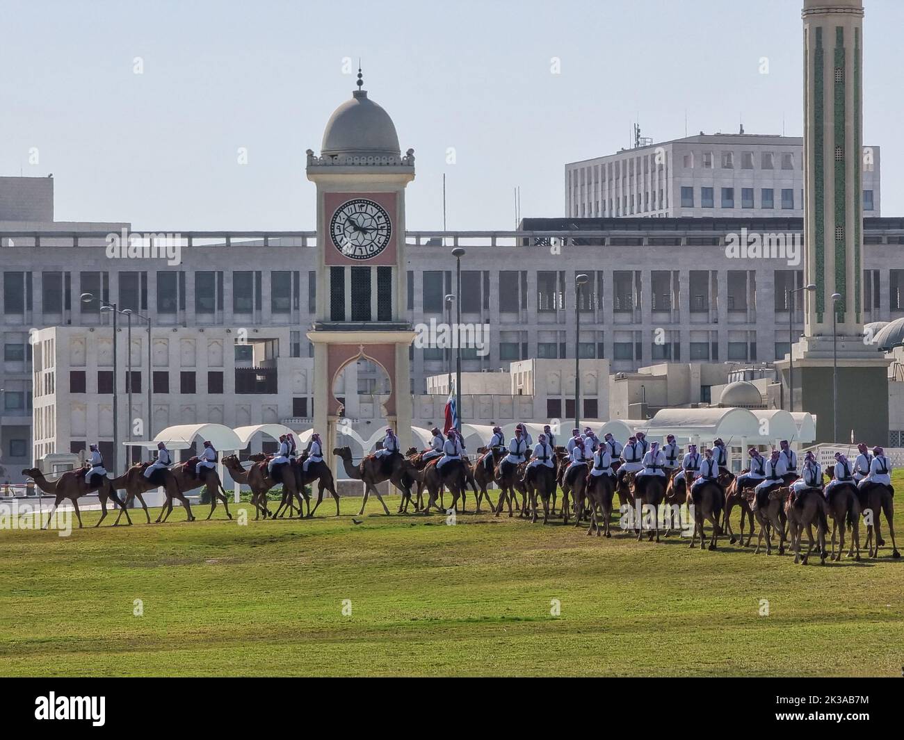 Police on camel in traditional clothes in Doha, Qatar. Doha has a