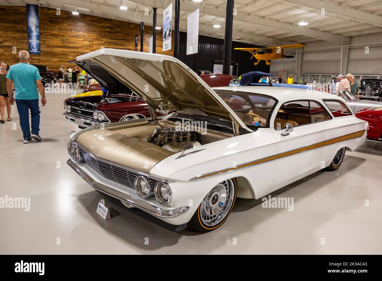 A white 1961 Chevrolet Impala station wagon restomod on display at the Worldwide Auctioneers 2022 Auburn Auction in Auburn, Indiana, USA. Stock Photo