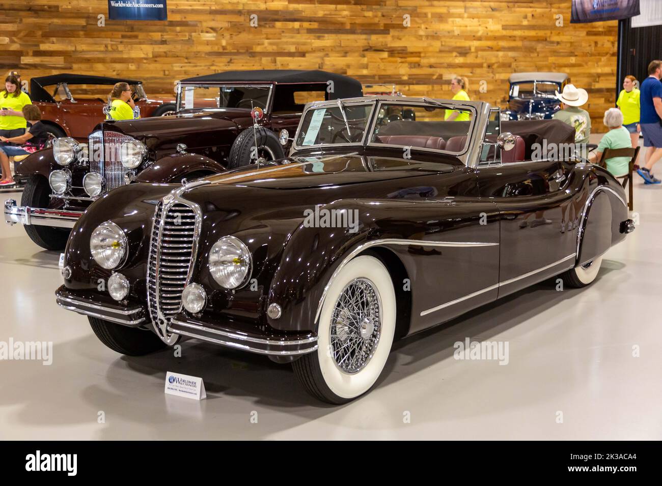 An antique brown 1950 Delahaye 135M Cabriolet by Barou on display at the Worldwide Auctioneers 2022 Auburn Auction in Auburn, Indiana, USA. Stock Photo