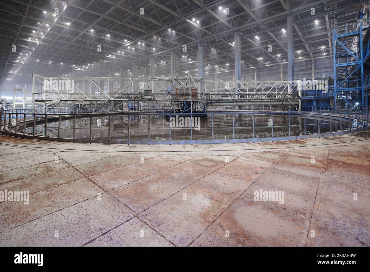Large round floatation machine tank full of liquid at plant Stock Photo ...