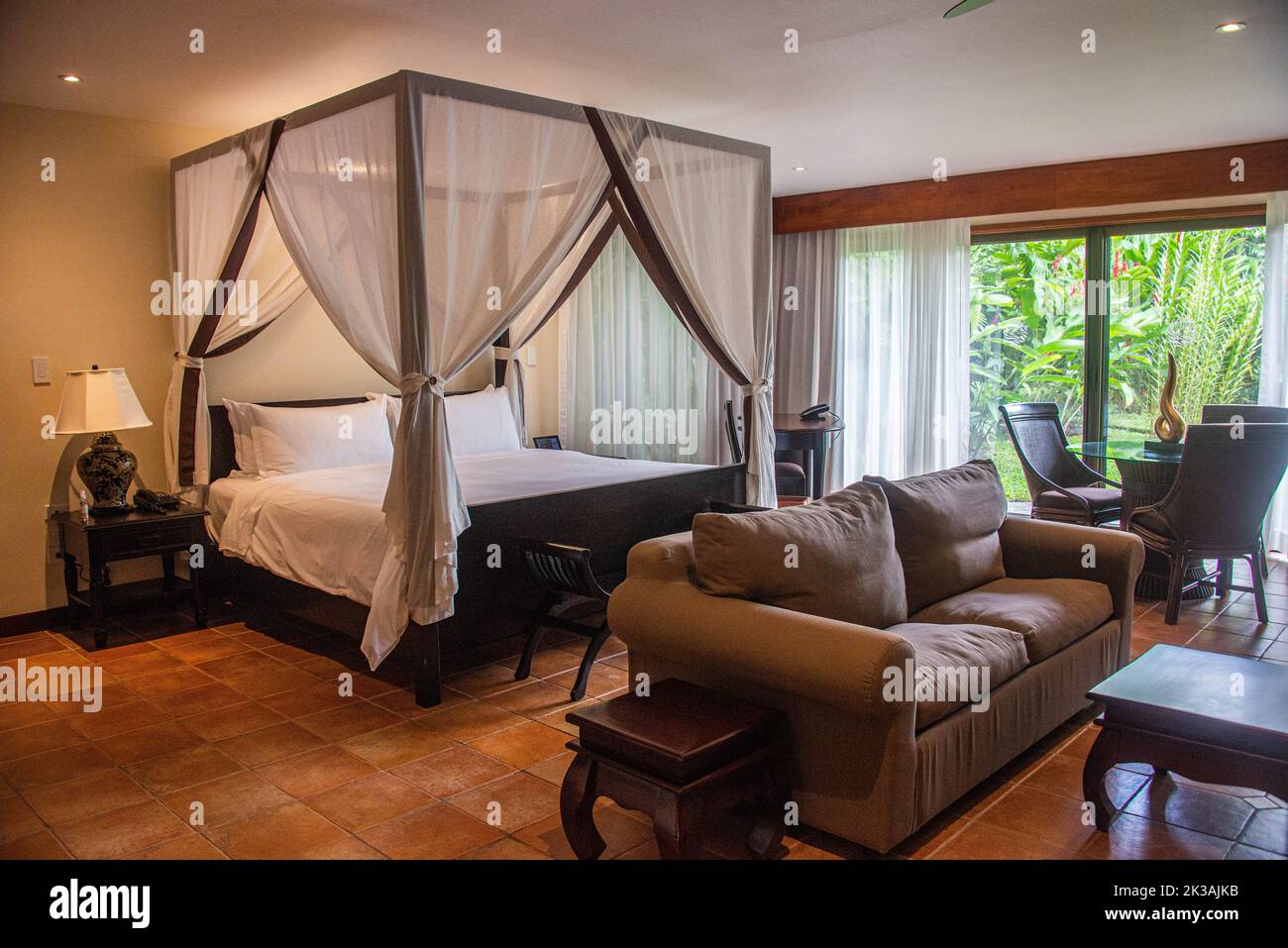 Four-poster bed at the Tabacon Resort, La Fortuna, Costa Rica Stock Photo