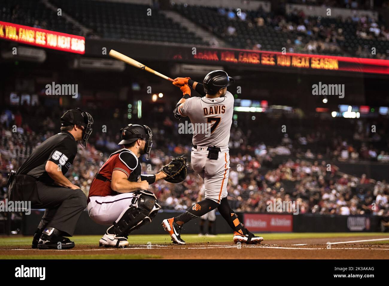 San Francisco Giants first baseman J.D. Davis (7) singles on a line drive to left field in the first inning of an MLB baseball game against the Arizon Stock Photo