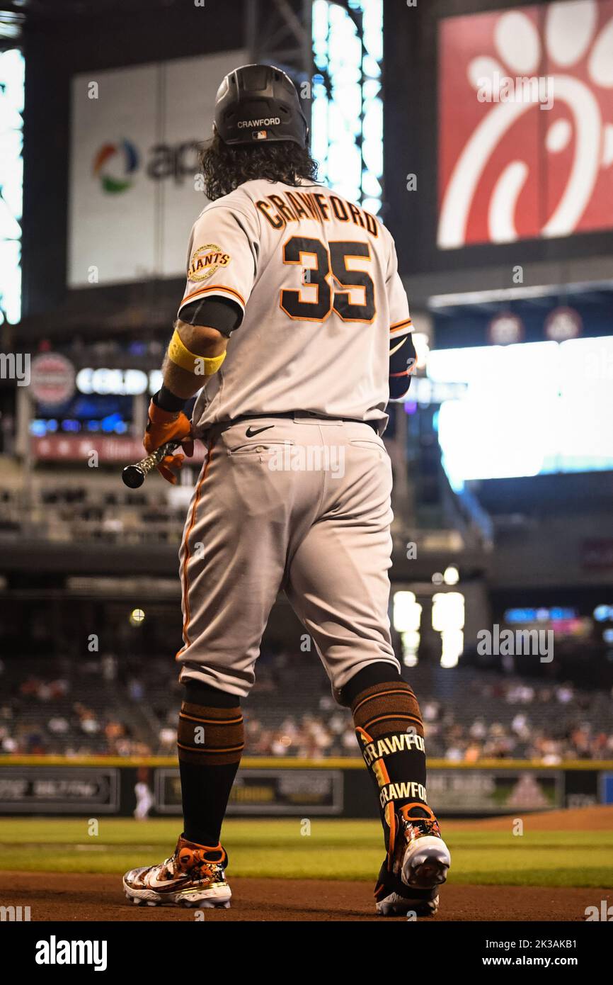 San Francisco Giants shortstop Brandon Crawford (35) stands in the on-deck circle in the first inning of an MLB baseball game against the Arizona Diam Stock Photo