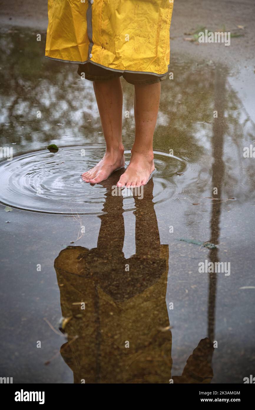 Child Puddle Ripple Ripple reflection kid hi-res stock photography and images - Alamy