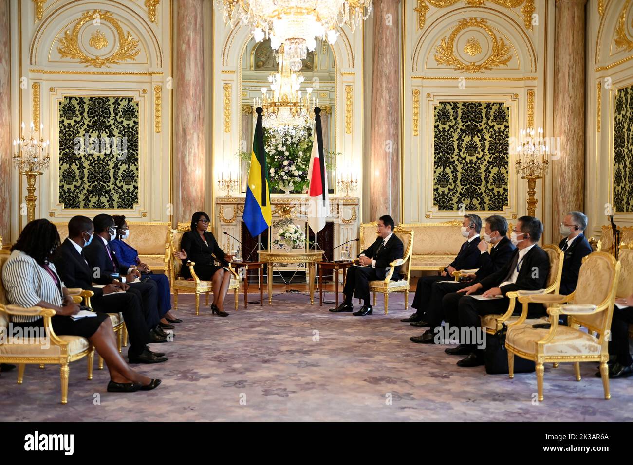 TOKYO, JAPAN - SEPTEMBER 26 : Gabon Prime Minister Rose Christiane Ossouka Raponda and Japan's Prime minister Fumio Kishida (R) talk during the Japan-Gabon Summit Meeting at Akasaka Palace State Guest House in Tokyo, Japan on September 26, 2022 in Tokyo, Japan. Gabon Prime Minister Rose Christiane Ossouka Raponda and Moussa Adamo, Minister of Foreign Affairs of Republic of Gabon, are visiting Japan within the state funeral for former Prime Minister Shinzo Abe that will be held on September 27 in the capital of Japan. David Mareuil/Pool via REUTERS Stock Photo
