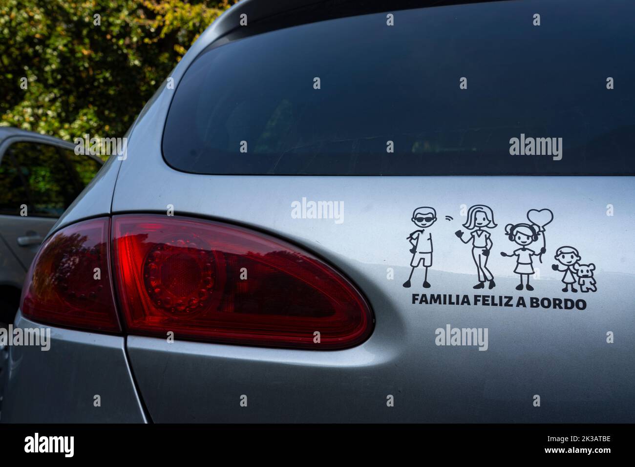 Madrid, Spain, September 2022.  'happy family on board' sticker on the back of a Spanish car Stock Photo