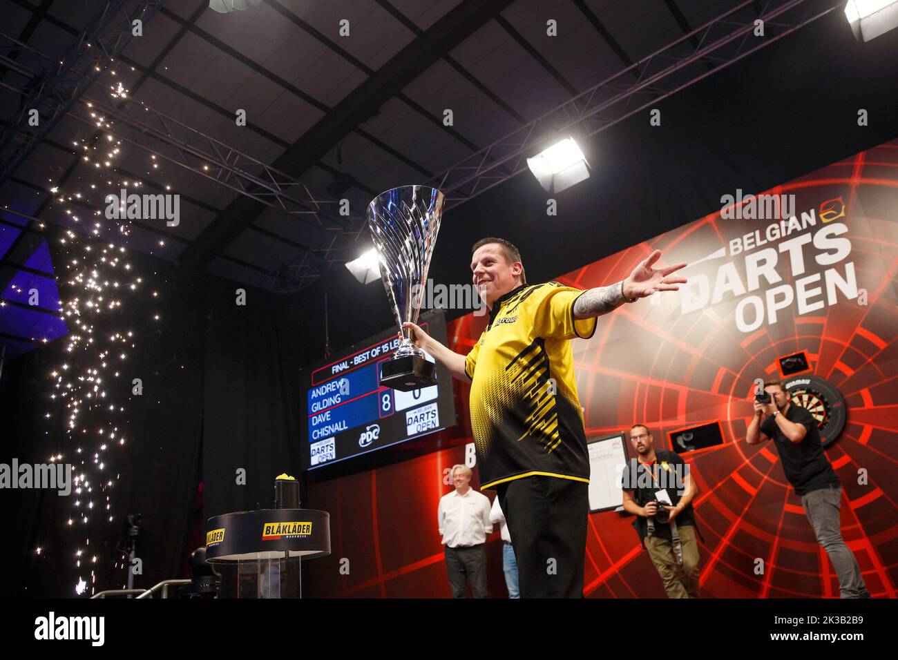 English Dave Chisnall celebrates after winning the third day of the