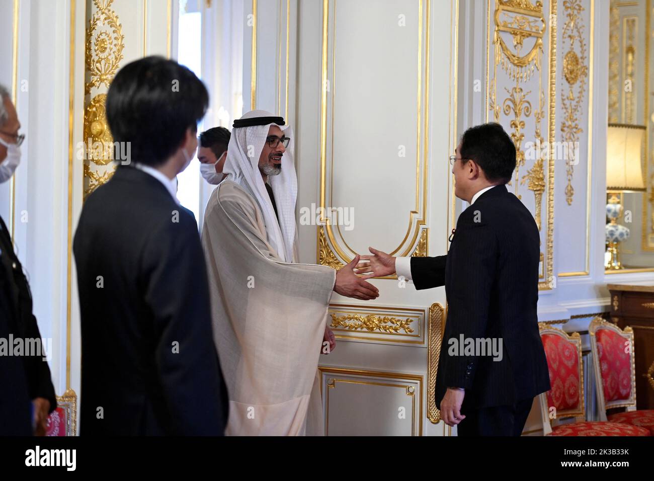 TOKYO, JAPAN - SEPTEMBER 26 : Sheikh Khalid bin Mohamed bin Zayed AL NAHYAN, Member of Abu Dhabi Executive Council, Chairman of Abu Dhabi Executive Office is welcomed by Japan's Prime Minister Fumio Kishida (R) prior their bilateral meeting at Akasaka Palace State Guest House in Tokyo, Japan on September 26, 2022 in Tokyo, Japan. Sheikh Khalid bin Mohamed bin Zayed AL NAHYAN is visiting Japan within the state funeral for former Prime Minister Shinzo Abe that will be held on September 27, in the capital of Japan. David Mareuil/Pool via REUTERS Stock Photo