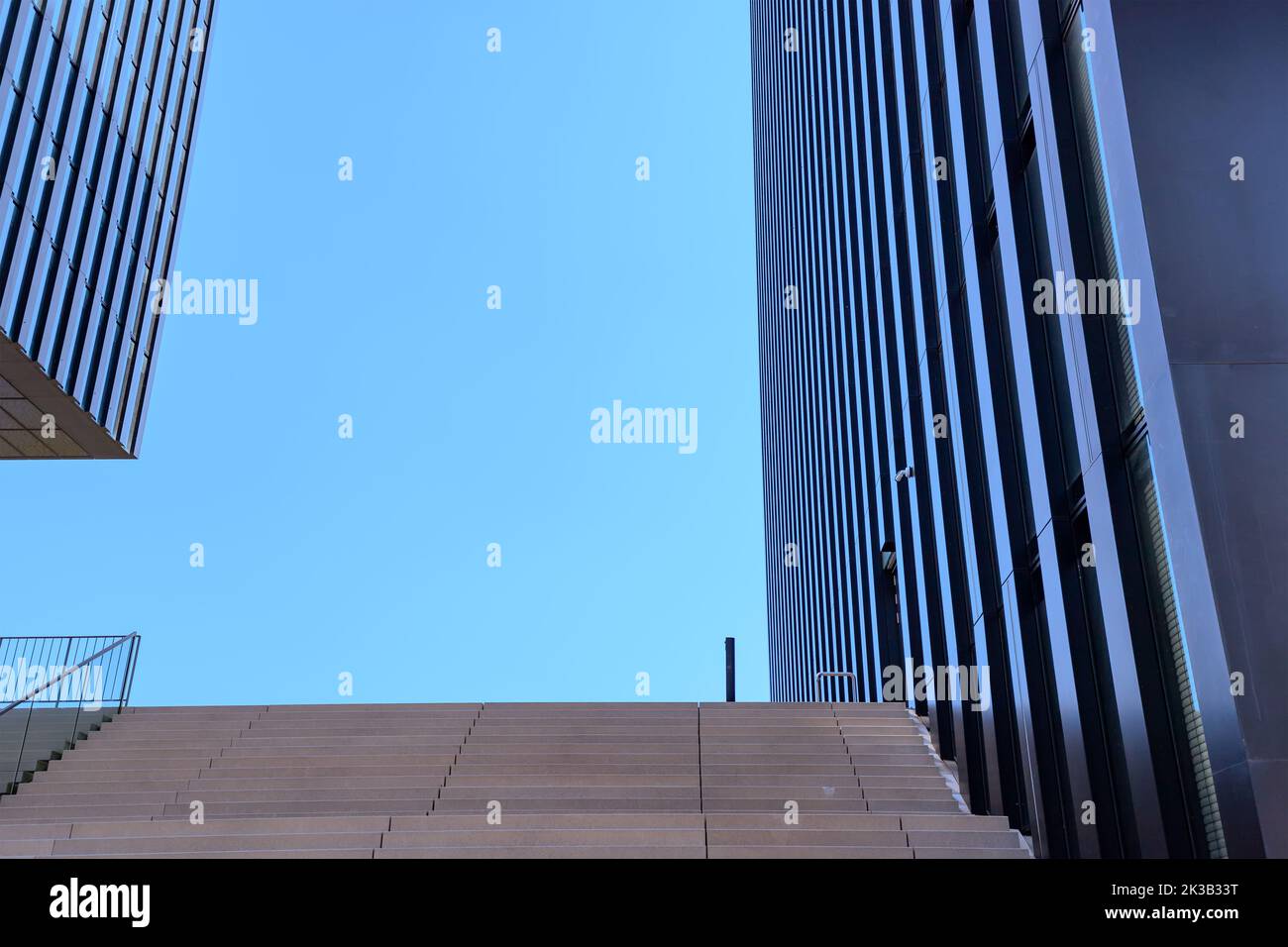 Abstract low angle view of business skyscraper building and stairs Stock Photo