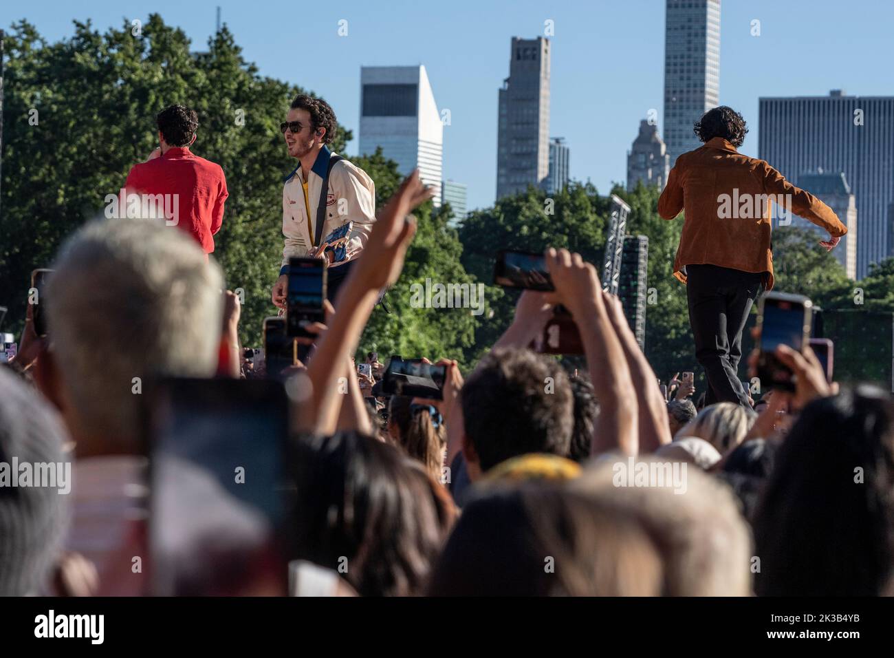 New York, NY - September 24, 2022: Audience reacts as Jonas Brothers perform at Global Citizen Festival NYC in Central Park Stock Photo