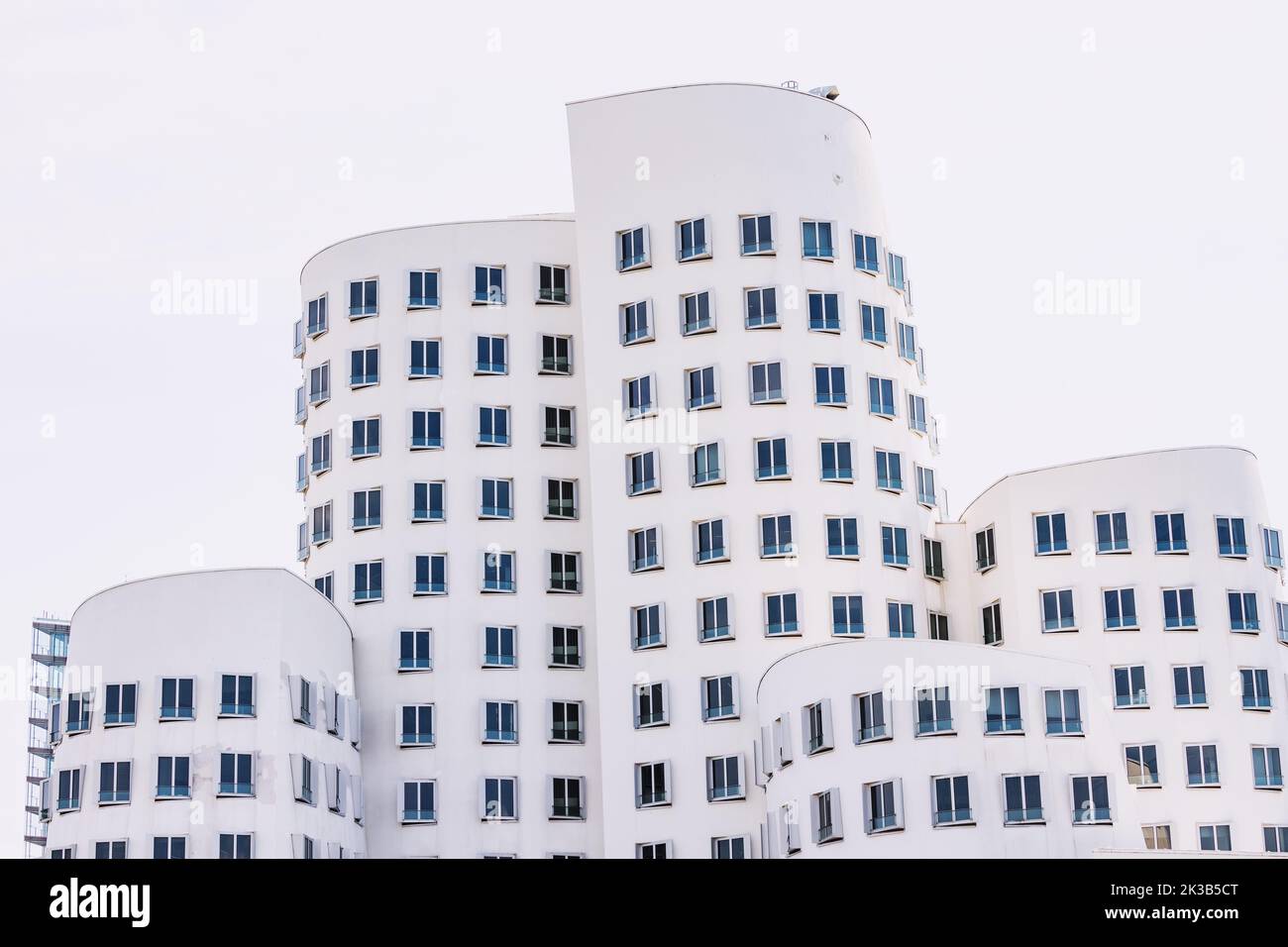 23 July 2022, Dusseldorf, Germany: Gehry Bauten or Zollhof unusual modern architecture buildings in Media Harbor. Dancing houses and travel attraction Stock Photo
