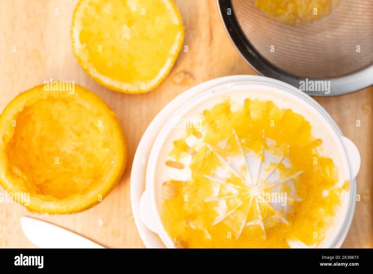 making fresh orange juice at home Stock Photo