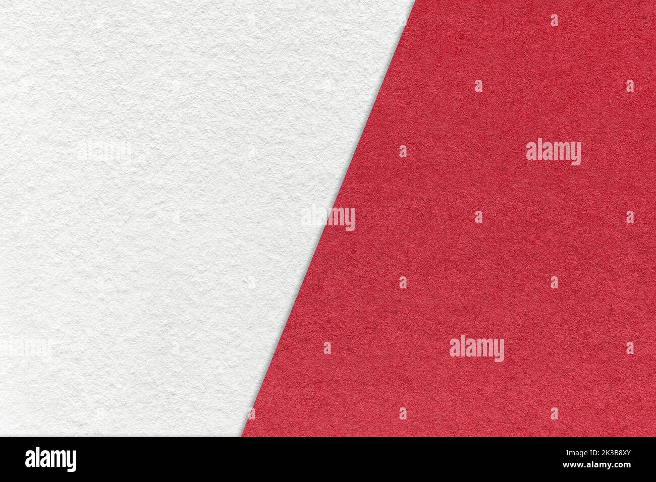 Texture of craft white and red paper background, half two colors, macro ...