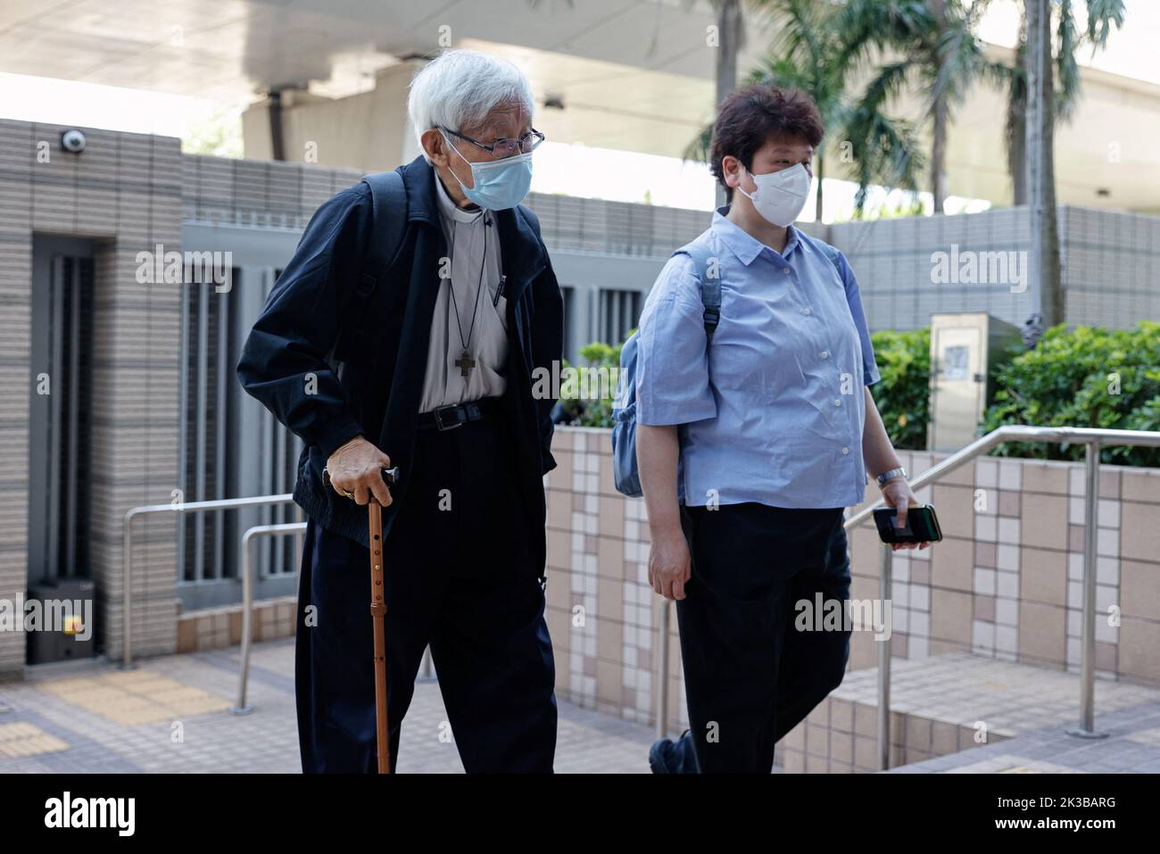 Retired bishop Cardinal Joseph Zen Ze-kiun arrives at the West Kowloon Magistrates' courts for allegedly failing to register the legal and medical fund that helped those embroiled in the 2019 anti-government protests as a society, in Hong Kong, China September 26, 2022. REUTERS/Tyrone Siu Stock Photo