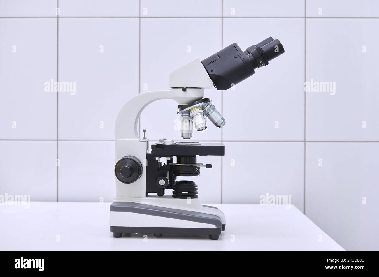 Microscope on a table in a medical laboratory. Stock Photo