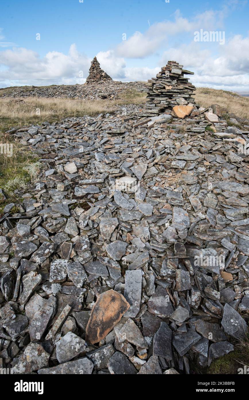 Cairns on top of Fountains Fell, a mountain in the Yorkshire Dales.The main summit (SD864716) has a height of 668 metres (2,192 ft) . Stock Photo