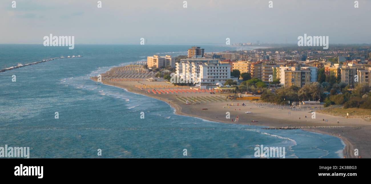 Aerial shot of sandy beach with umbrellas, typical adriatic shore ...