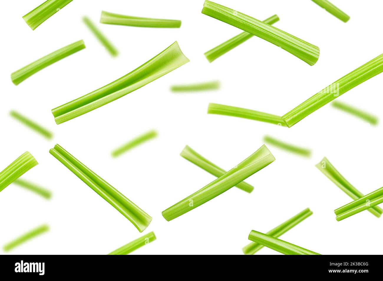 Falling celery isolated on white background, selective focus Stock Photo