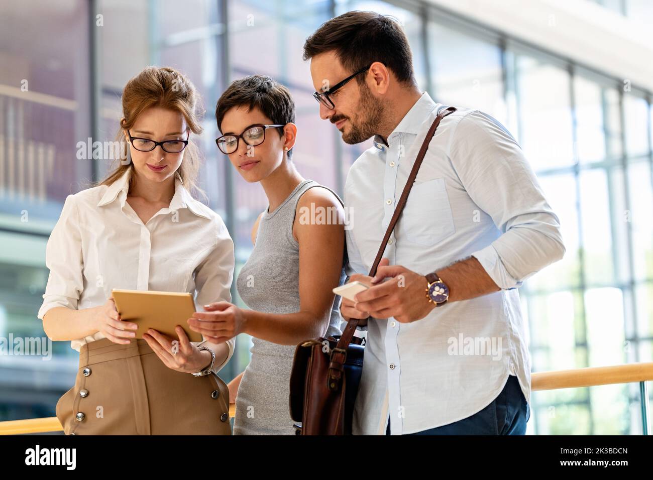 Collaboration and analysis by business people working together in office Stock Photo
