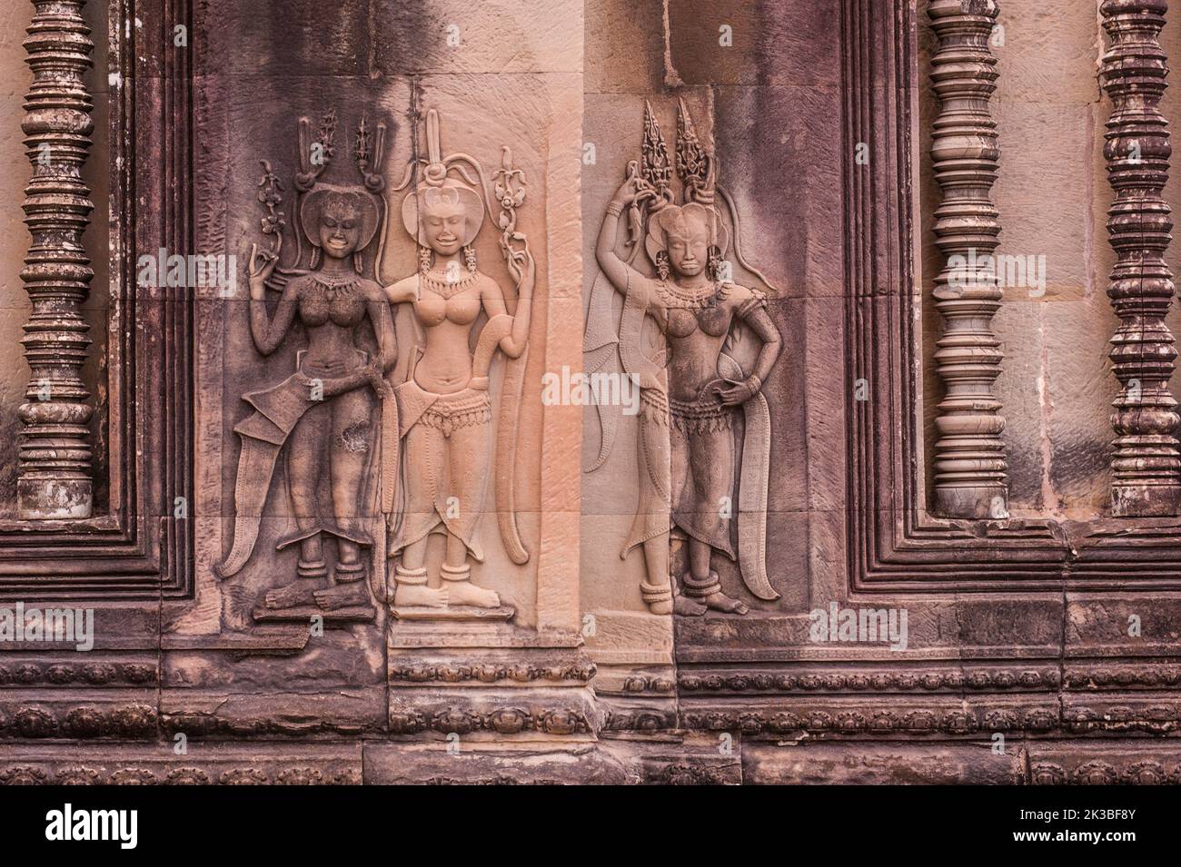 Ancient Apsara bas-reliefs (frieze) at Angkor Wat, Siem Reap Province, Cambodia. credit: Kraig Lieb Stock Photo