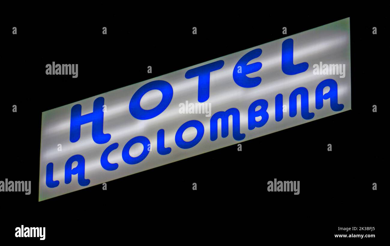 The only light in the night / La única luz en la noche / Ainoa valo yössä. Hotel La Colombina's sign. San Sebastián de La Gomera, Canary Islands, Spai Stock Photo