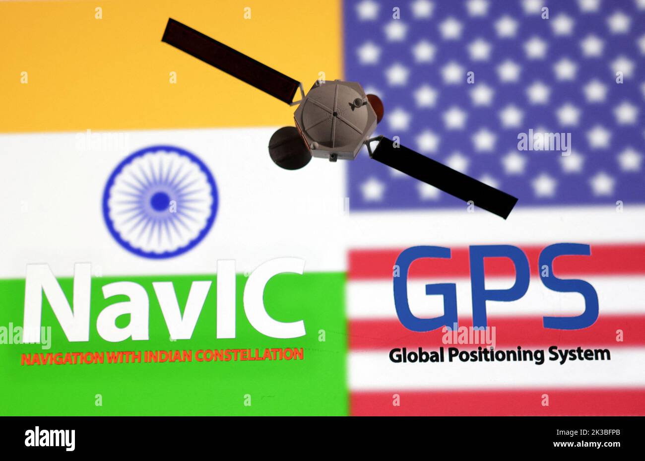 NavIC (Navigation with Indian Constellation) and GPS (Global Positioning System) logos and Satellite model placed on the U.S. and India flags are seen in this illustration taken, September 25, 2022. REUTERS/Dado Ruvic/Illustration Stock Photo