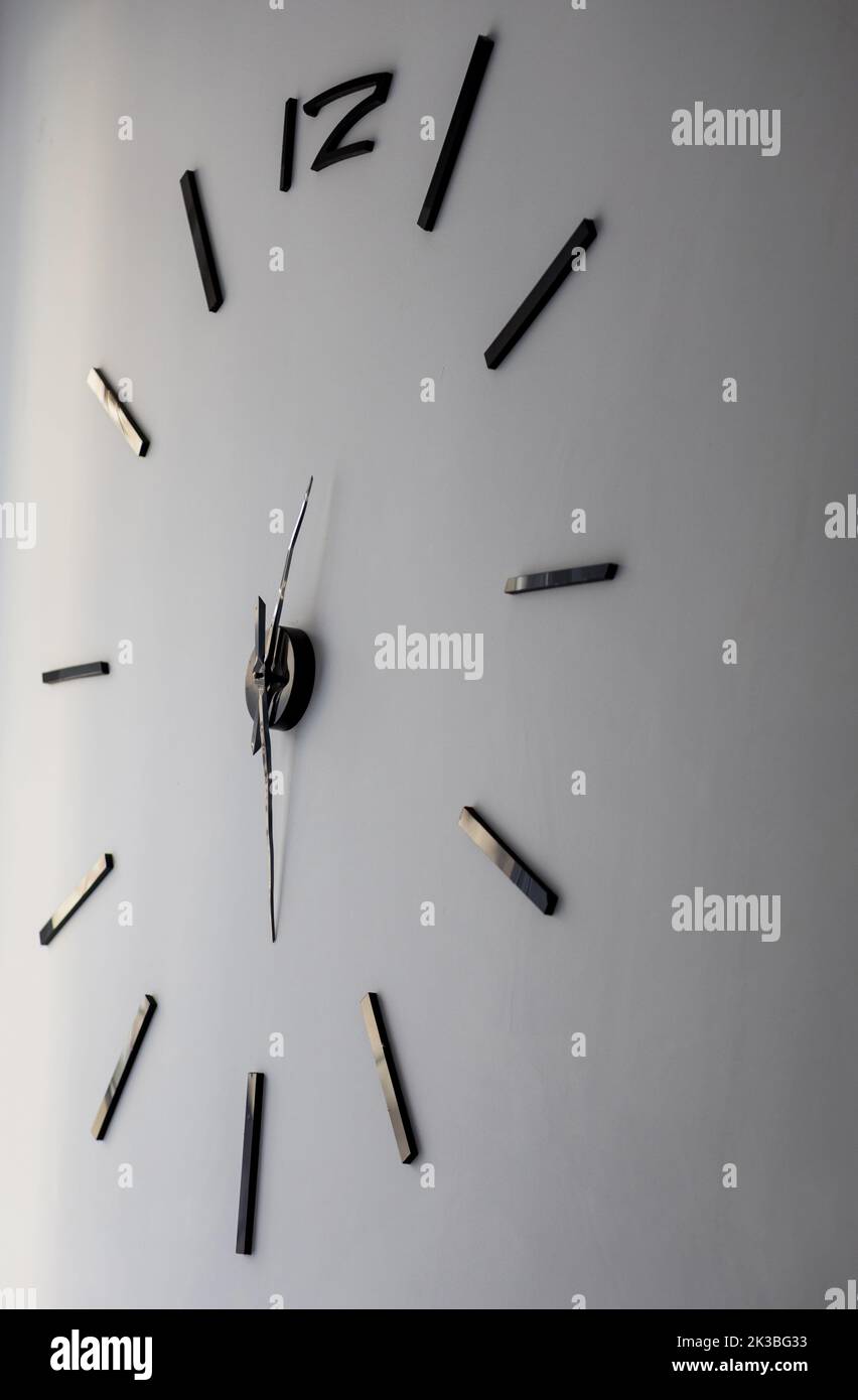 Decorative of wall clock. Minimalistic design of contemporary style